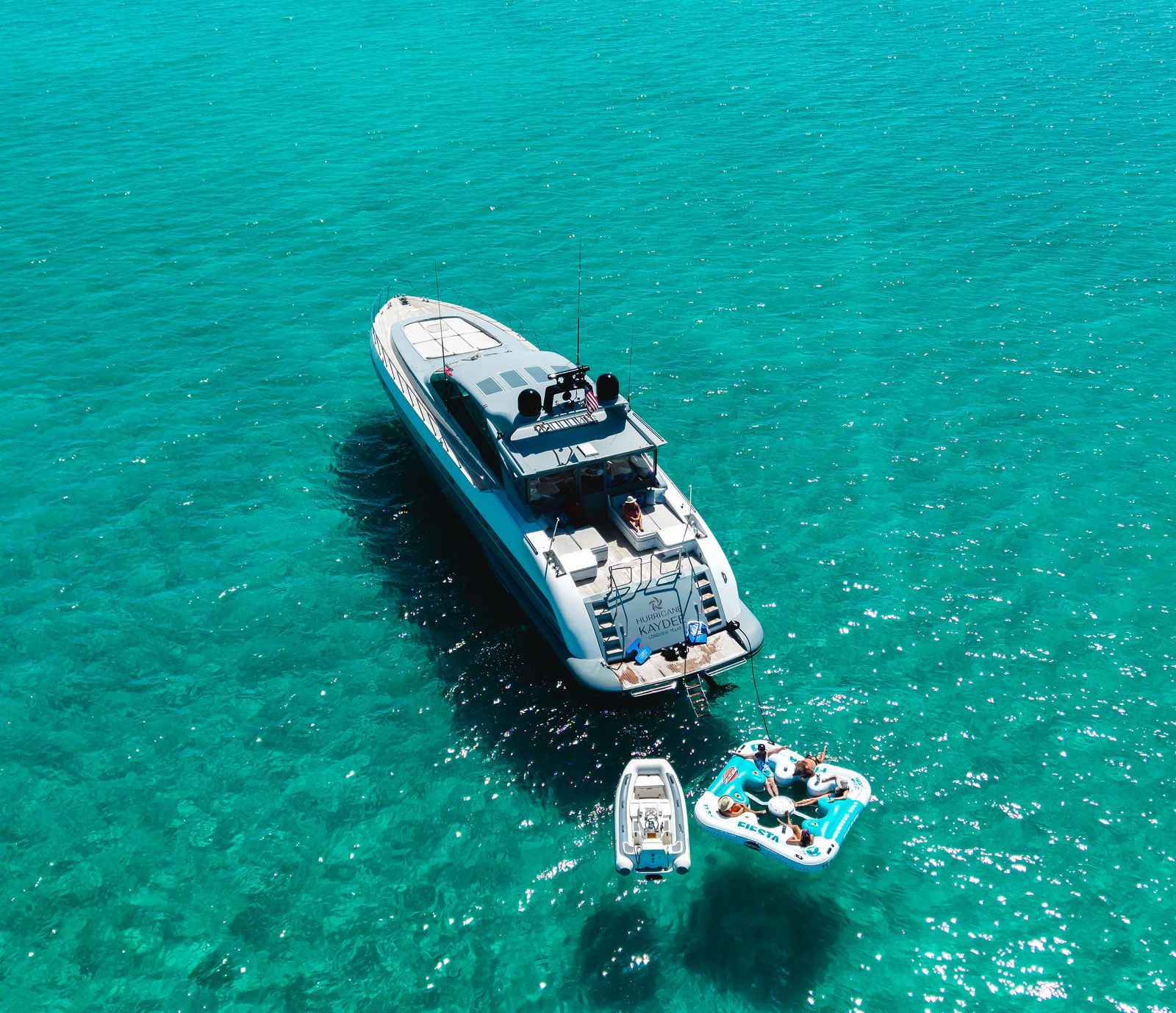 KayDee Mangusta 80 anchored at private sandbar turquoise water Bahamas