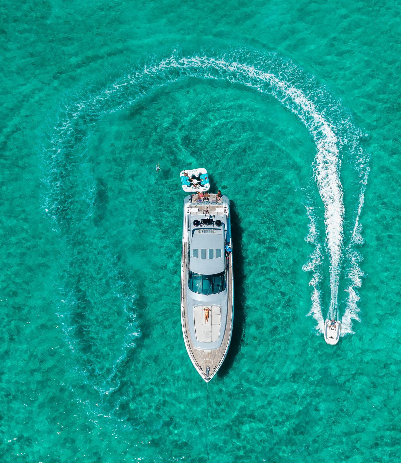 KayDee Mangusta 80 carving a wake circle aerial view Bahamas