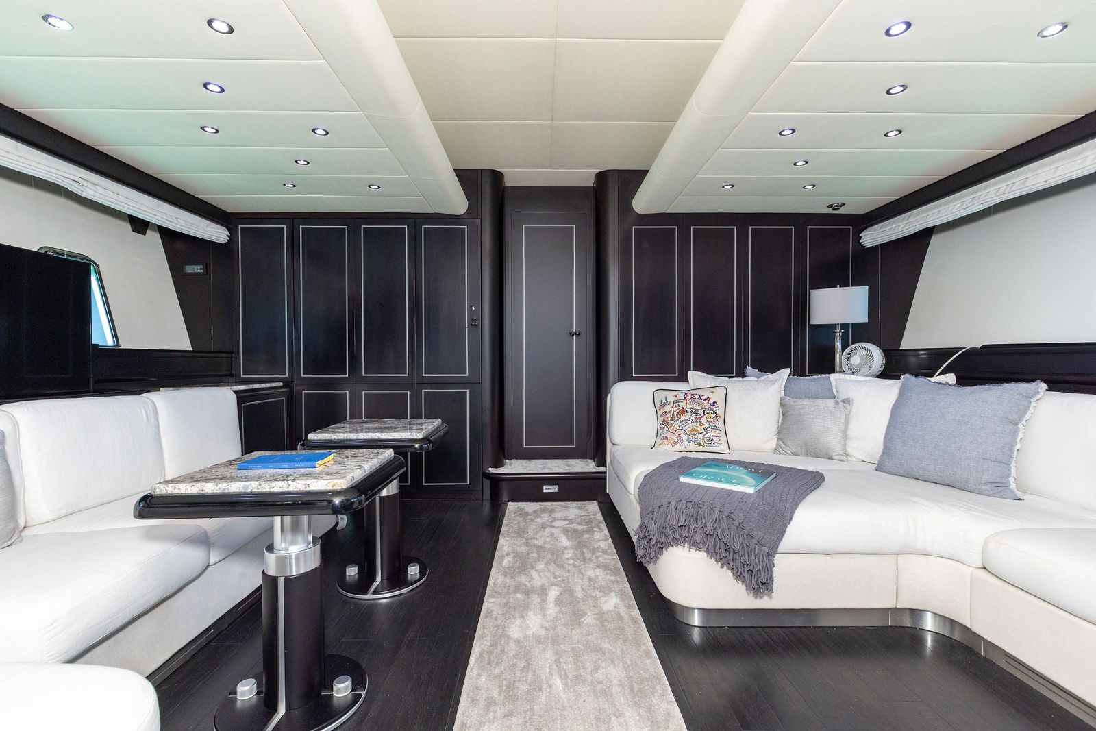 KayDee Mangusta 80 lower salon wide view luxury yacht charter