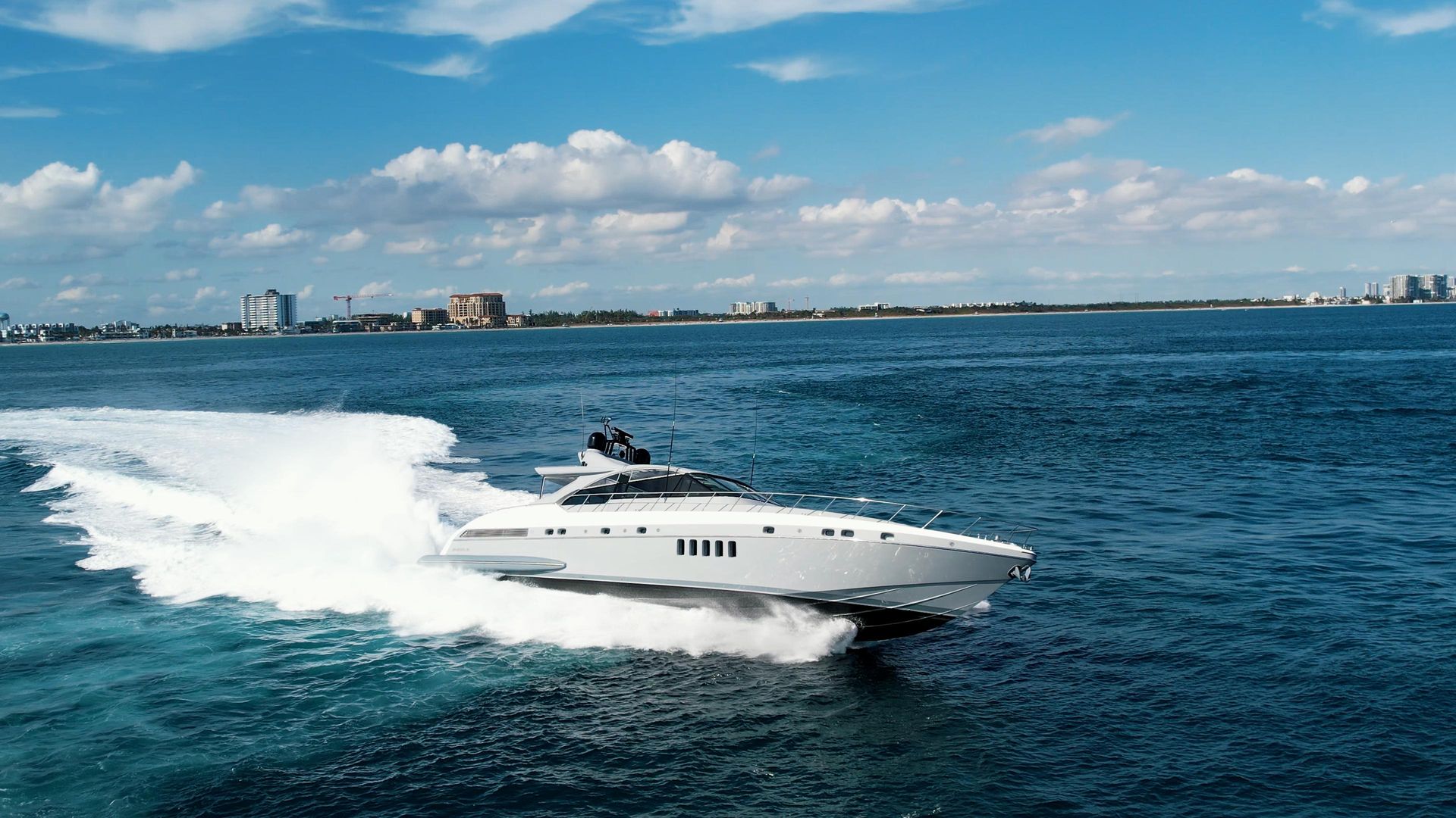 KayDee Mangusta 80 full speed wake exploding private yacht charter Bahamas