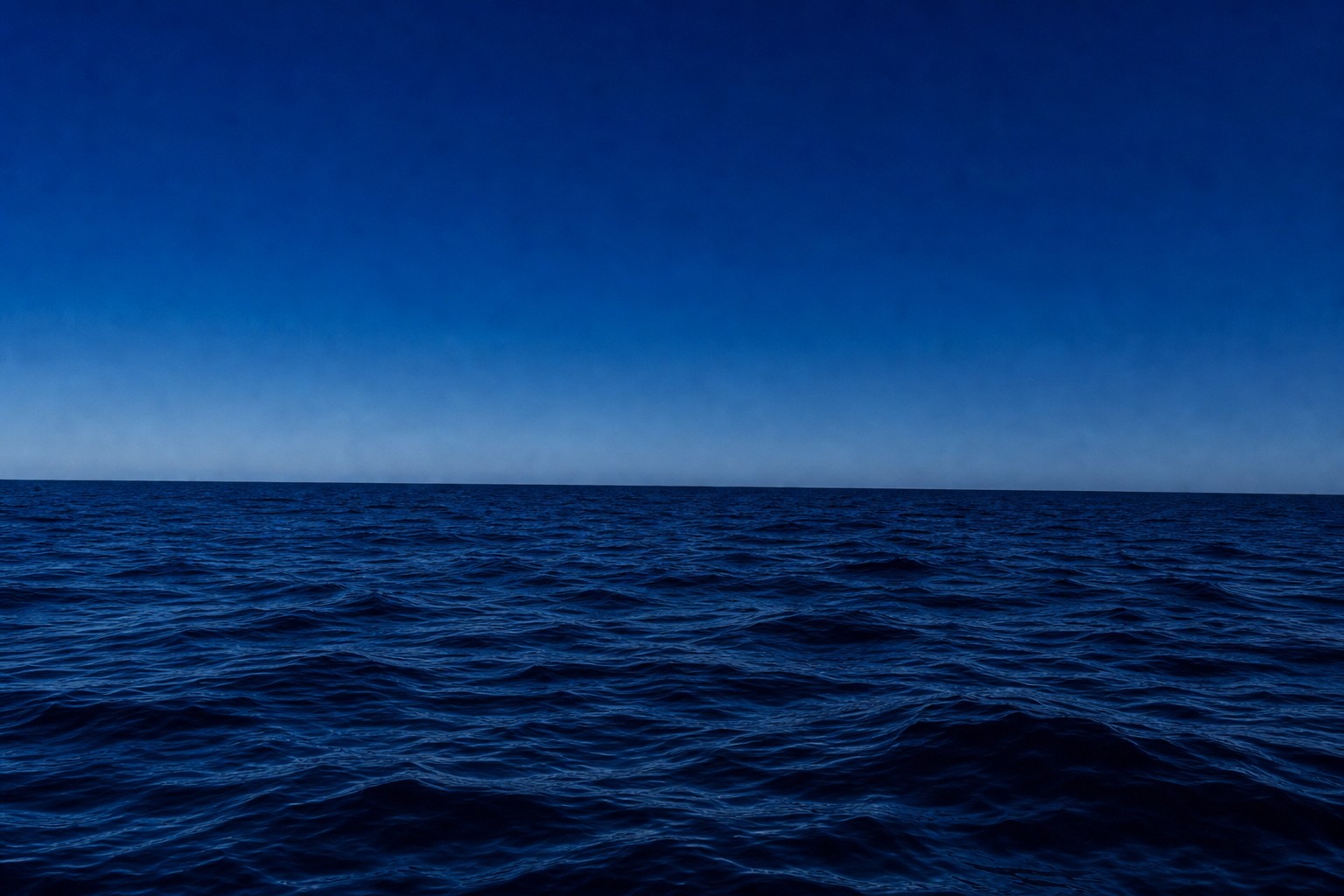 Deep blue open ocean water private yacht charter Bahamas